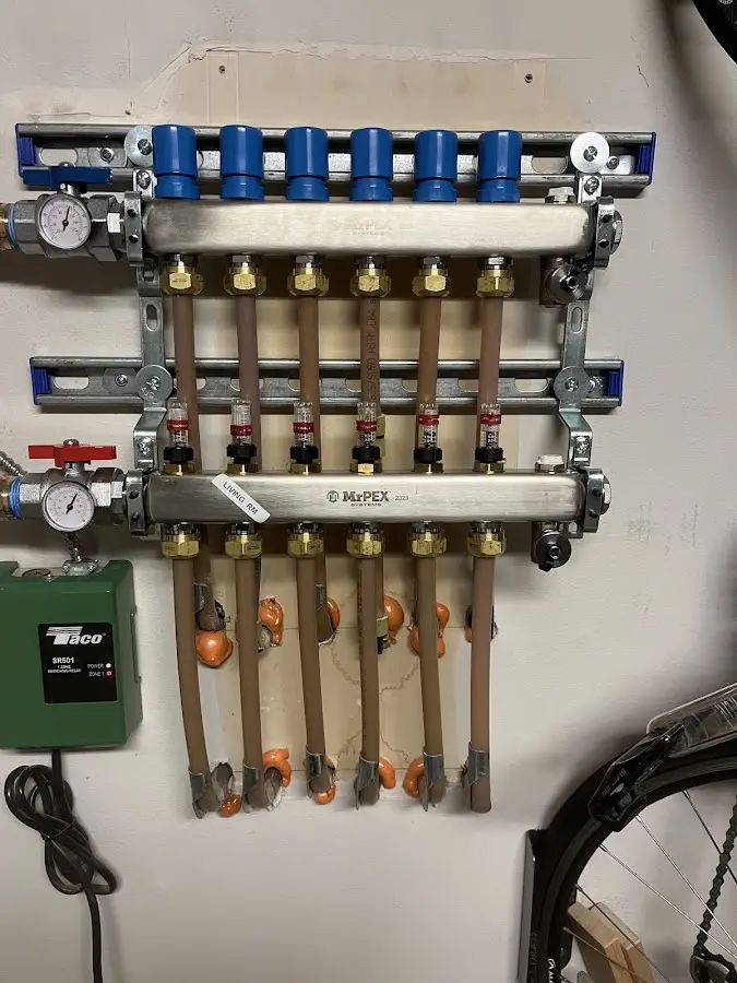 Plumber performing Gas Leak Detection at a residential property in Wauwatosa